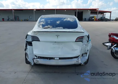 2022 Tesla Model Y Long Range Dual Motor All-Wheel Drive from USA, damaged, VIN 7SAYGAEE2NF514873